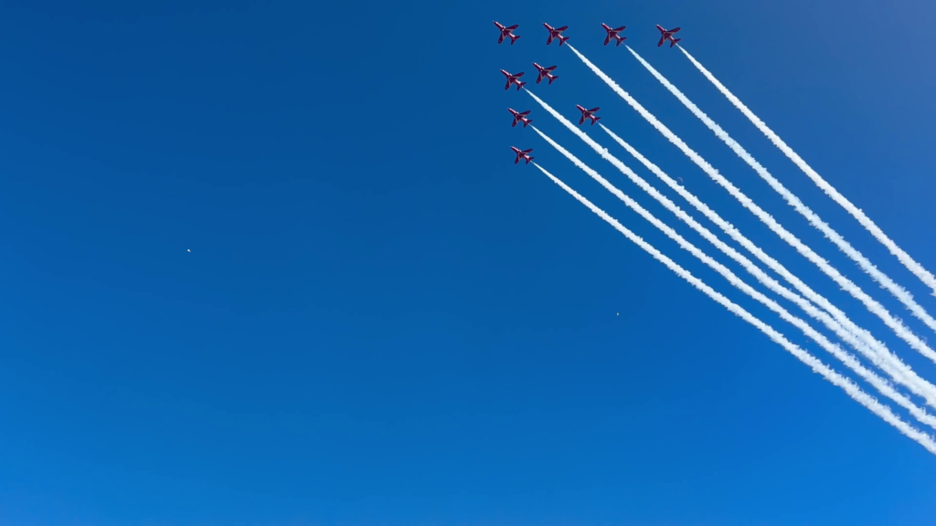Red Arrows flying over Glastonbury 2023 taken by GB Helicopters